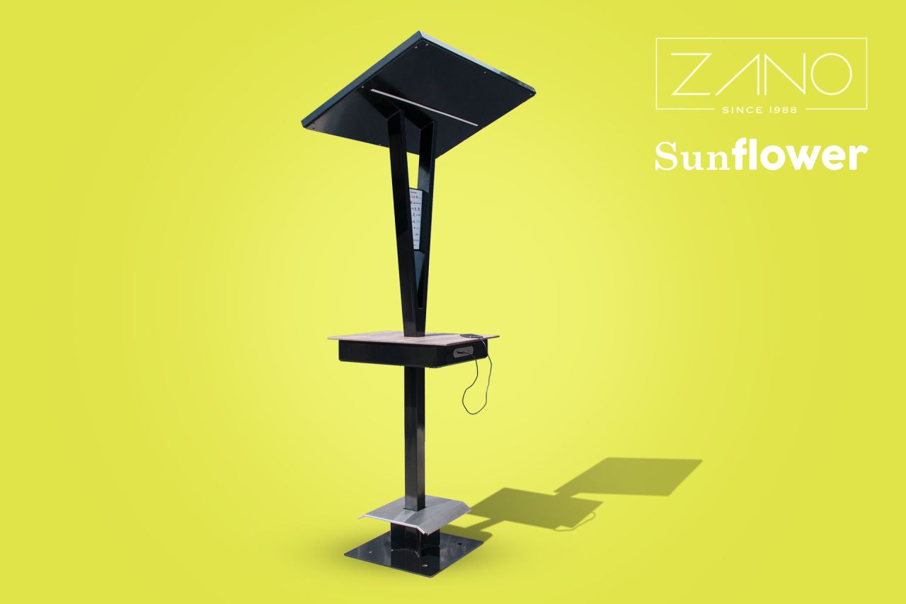 Stacja solarna posiadająca stolik z portami USB i ładowarką indukcyjną